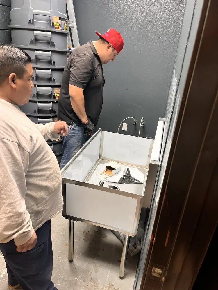 Commercial plumbing and sink installation in McCalla